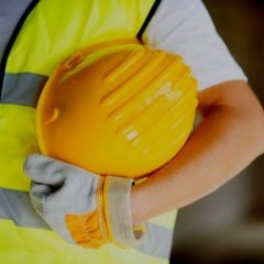 Workers with yellow helmet | DYS Law Group